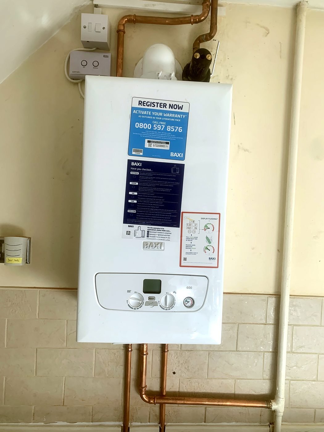 Baxi 600 combi with new copper on a tiled wall