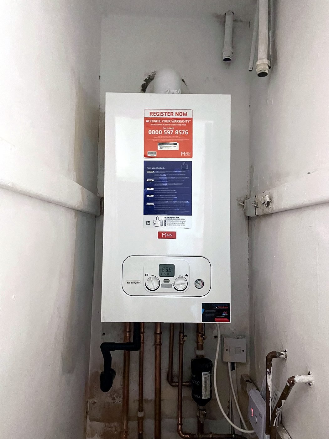 Main Eco Compact fitted in a narrow cupboard