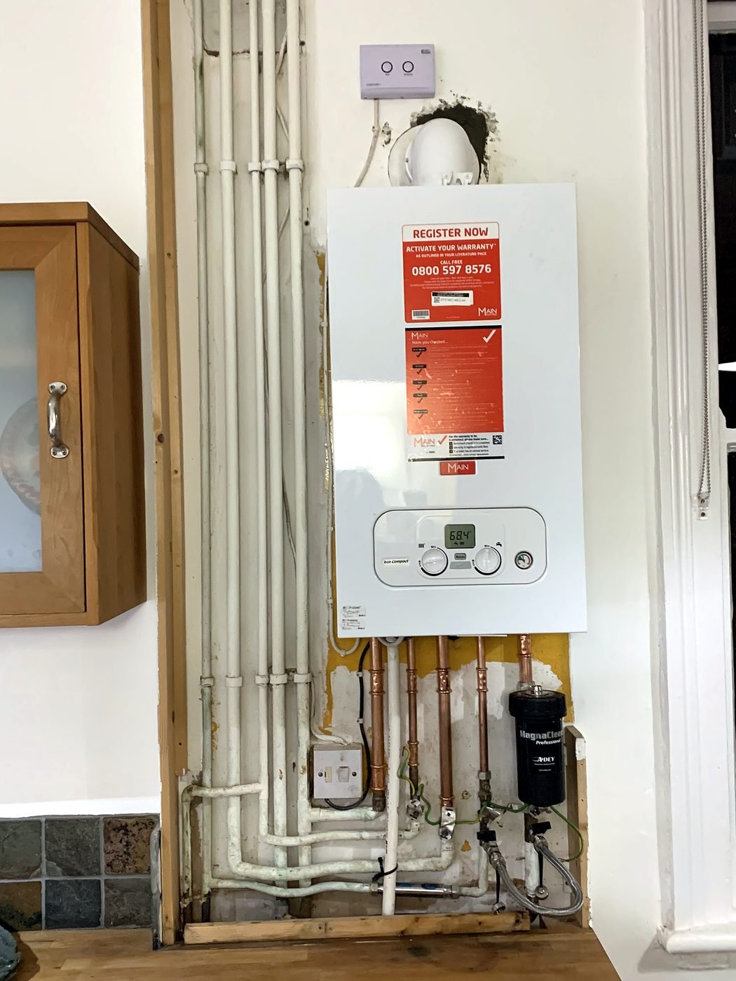 Main Eco Compact combi installed with new copper pipework and magnetic filter